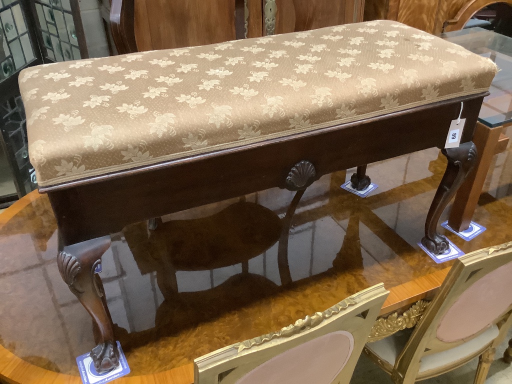 A 1920's Chippendale revival mahogany duet piano stool, length 92cm, depth 40cm, height 54cm